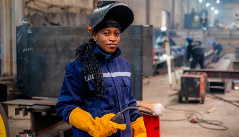 Woman welding in the energy industry
